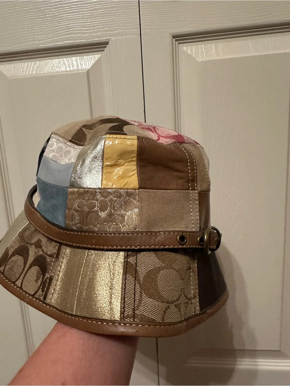 Coach Patchwork Signature Shoulder Bag with matching hat.